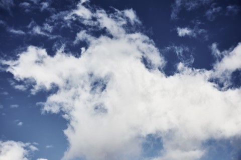 White clouds against blue sky