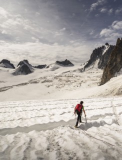Rear view of climber on glacier