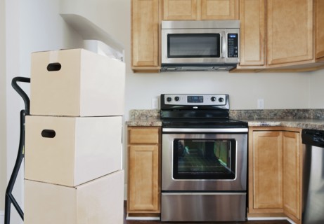 Moving boxes in kitchen