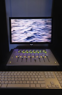 Mixing console and computer in recording studio