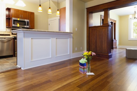 Flowers and gift on floor in new house