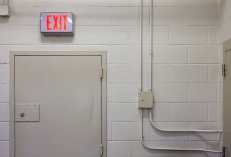 Exit sign in industrial interior