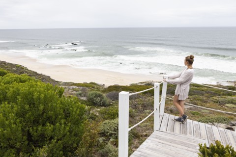 Girl looking at ocean view