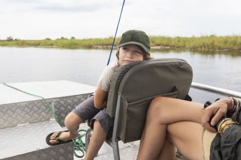 Boy in boat on Zambezi River
