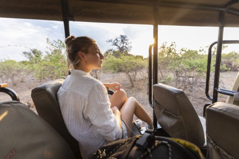 Girl in safari vehicle