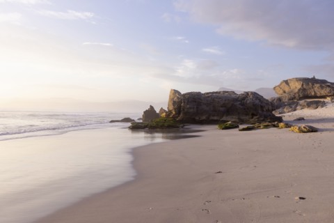 Rock formations on Sopiesklip beach in Walker Bay Nature Reserve