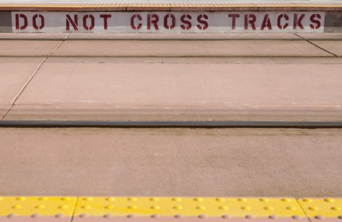 Warning text on platform