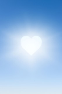 White heart against blue sky