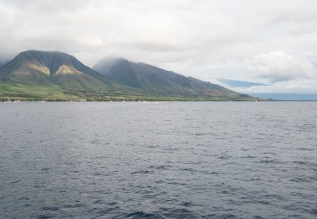 Scenic view of hills and water