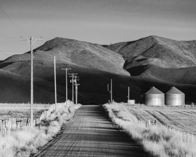 Country road leading to mountains
