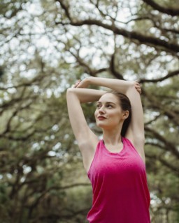 Woman stretching in park