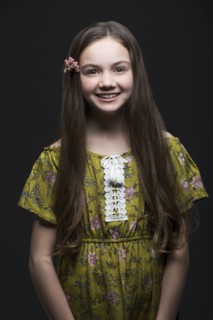Studio portrait of smiling girl