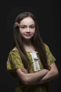 Studio portrait of smiling girl