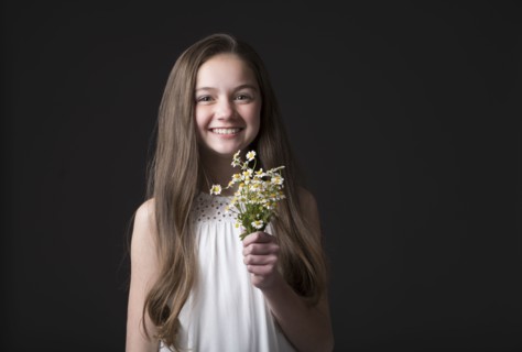 Studio portrait of smiling girl