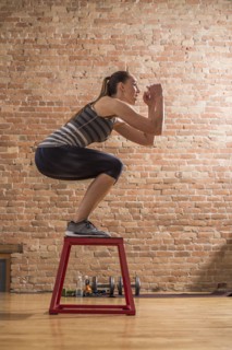 Woman exercising in gym