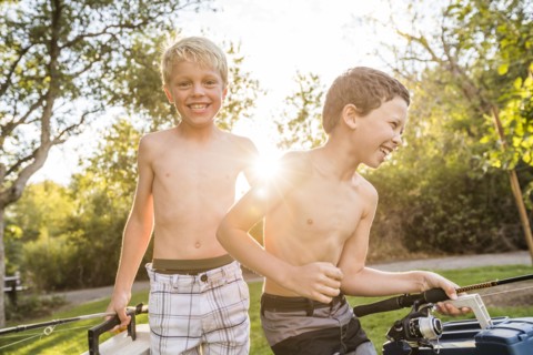 Smiling shirtless boys