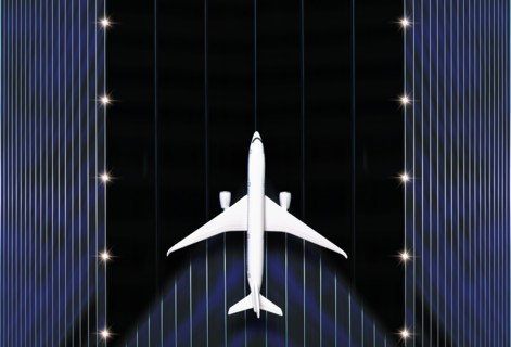 Overhead view of airplane on runway