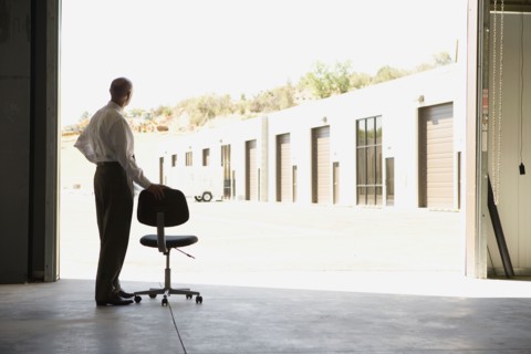 Businessman in warehouse