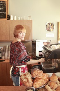 Portrait of woman working in bakery