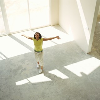 Happy woman in new home