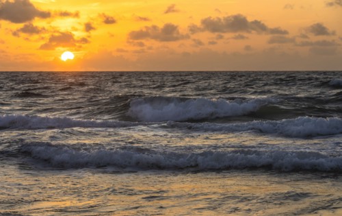 Ocean waves at sunrise