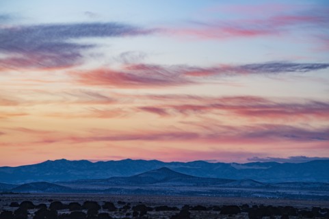 Sun setting over hills in Cerrillos Hills State Park