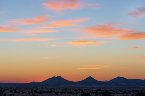 Sun setting over hills in Cerrillos Hills State Park