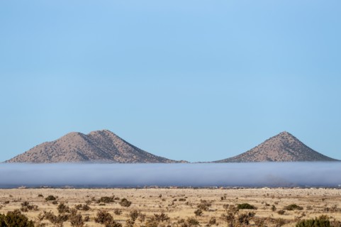 Fog above desert landscape in Cerrillos Hills State Park