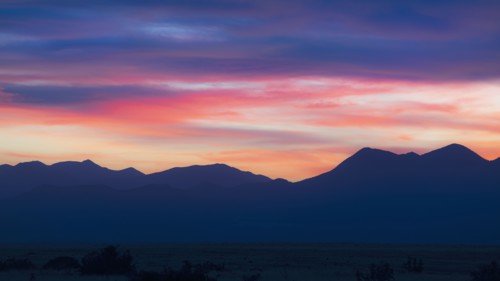 USA, New Mexico, Santa Fe, Sunset sky above Jemez Mountains