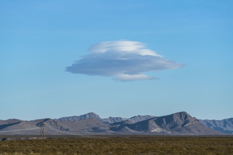 Lenticular cloud over landscape