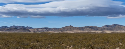 Clouds over desert landscape in Gila National Forest