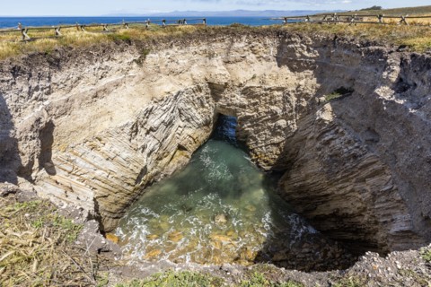 Coastal view and sinkhole near Montana de Oro State Park