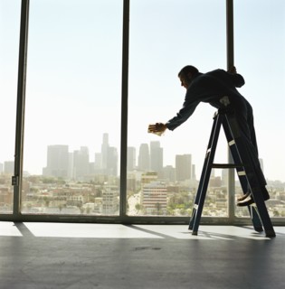 USA, California, Los Angeles, Window washer cleaning windows