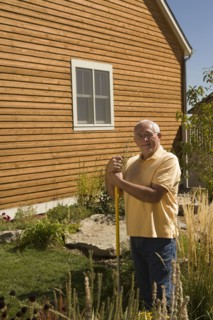 Portrait of senior man in garden
