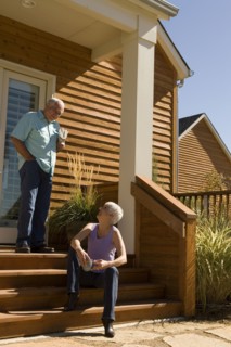 Couple on home front steps