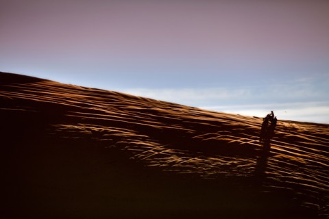 Person riding ATV in desert