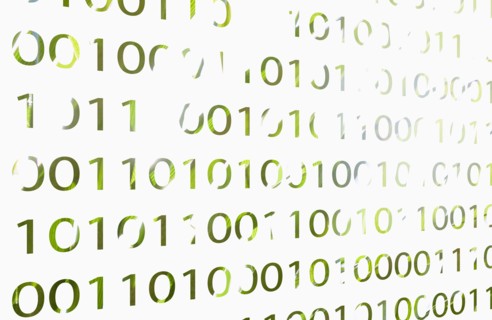 Close-up of binary code on computer monitor