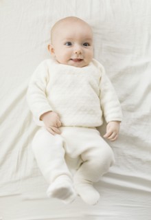 Overhead view of smiling baby boy