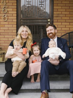 Portrait of parents with three children