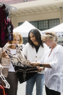 Women shopping at street market