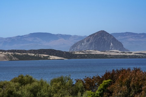Dormant volcano Morro Rock at entrance to bay