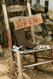 Rustic chair with sign