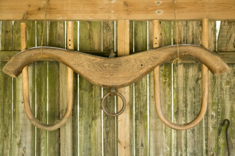 Yoke hanging on wooden barn