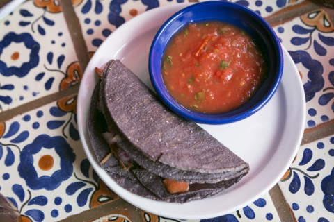 Taco with salsa on plate