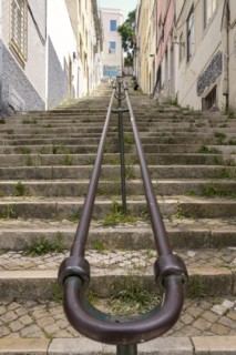 Metal railing and stone steps