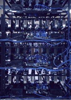 Close-up of computer cables and hard drives in server room
