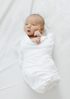 Overhead view of newborn baby boy