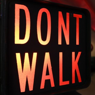 Close-up of illuminated traffic sign