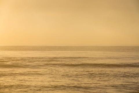 Calm ocean at sunrise