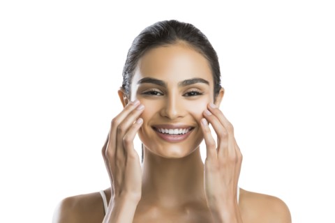 Portrait of young woman doing face massage